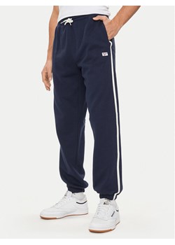 Reebok Spodnie dresowe Court Sport 100075479 Granatowy Relaxed Fit ze sklepu MODIVO w kategorii Spodnie męskie - zdjęcie 181065991