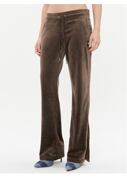 DKNY Sport Spodnie dresowe DP3P2744 Brązowy Regular Fit ze sklepu MODIVO w kategorii Spodnie damskie - zdjęcie 181066724