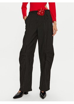 ROTATE Spodnie materiałowe Cassandria 1131372470 Czarny Loose Fit ze sklepu MODIVO w kategorii Spodnie damskie - zdjęcie 181068183
