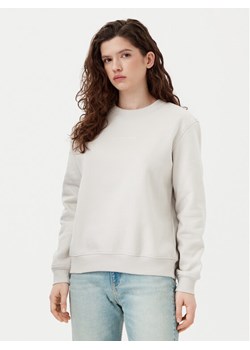 Calvin Klein Jeans Bluza Institutional Graphic J20J224731 Beżowy Regular Fit ze sklepu MODIVO w kategorii Bluzy damskie - zdjęcie 181068711
