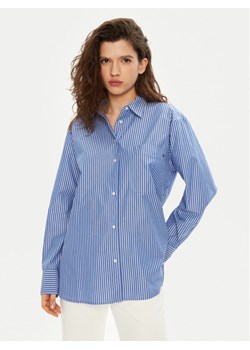 Tommy Hilfiger Koszula WW0WW45612 Niebieski Relaxed Fit ze sklepu MODIVO w kategorii Koszule damskie - zdjęcie 181069124