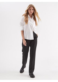 Calvin Klein Spodnie materiałowe Essential K20K206879 Czarny Slim Fit ze sklepu MODIVO w kategorii Spodnie damskie - zdjęcie 181069320