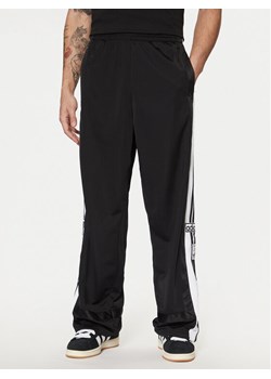 adidas Spodnie dresowe Adibreak JD4267 Czarny Loose Fit ze sklepu MODIVO w kategorii Spodnie męskie - zdjęcie 181069932