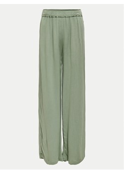 Kids ONLY Spodnie materiałowe Cornelia 15341432 Zielony Regular Fit ze sklepu MODIVO w kategorii Spodnie dziewczęce - zdjęcie 181070510