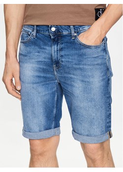 Calvin Klein Jeans Szorty jeansowe J30J322784 Niebieski Slim Fit ze sklepu MODIVO w kategorii Spodenki męskie - zdjęcie 181070833