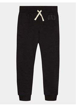 Gap Spodnie dresowe 860249-00 Czarny Regular Fit ze sklepu MODIVO w kategorii Spodnie chłopięce - zdjęcie 181070904