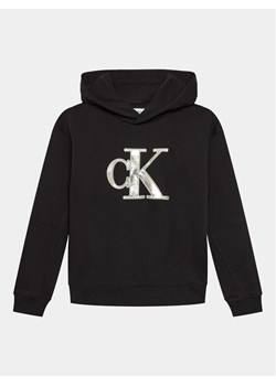 Calvin Klein Jeans Bluza Metallic Monogram IG0IG02298 Czarny Regular Fit ze sklepu MODIVO w kategorii Bluzy chłopięce - zdjęcie 181070962