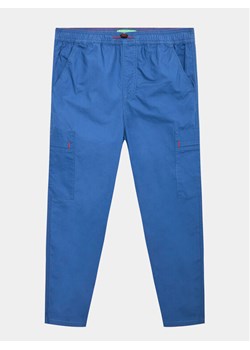 United Colors Of Benetton Spodnie materiałowe 4AC7CF01X Niebieski Regular Fit ze sklepu MODIVO w kategorii Spodnie chłopięce - zdjęcie 181071783