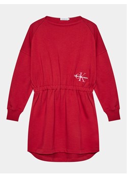 Calvin Klein Jeans Sukienka dzianinowa Monogram IG0IG02316 D Czerwony Relaxed Fit ze sklepu MODIVO w kategorii Sukienki dziewczęce - zdjęcie 181072021