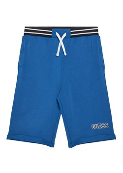 Guess Szorty sportowe L5GD12 KA6R4 Niebieski Oversize ze sklepu MODIVO w kategorii Spodenki chłopięce - zdjęcie 181073820