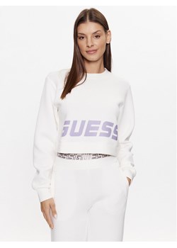 Guess Bluza V3YQ02 K7UW2 Granatowy Oversize ze sklepu MODIVO w kategorii Bluzy damskie - zdjęcie 181074323