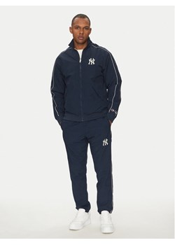 Champion Komplet dresowy 221238 Granatowy Regular Fit ze sklepu MODIVO w kategorii Dresy męskie - zdjęcie 181074531