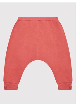 United Colors Of Benetton Spodnie dresowe 3QW0AF00H Różowy Regular Fit ze sklepu MODIVO w kategorii Spodnie i półśpiochy - zdjęcie 181076004