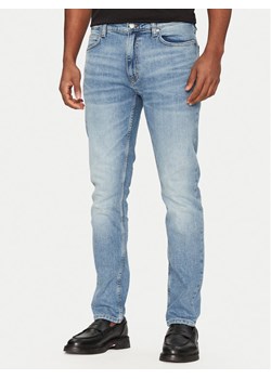 HUGO Jeansy 50537685 Niebieski Slim Fit ze sklepu MODIVO w kategorii Jeansy męskie - zdjęcie 181076110