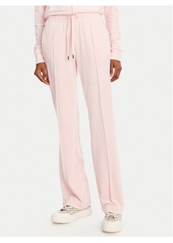 Juicy Couture Spodnie dresowe Tina JCAPW045 Różowy Regular Fit ze sklepu MODIVO w kategorii Spodnie damskie - zdjęcie 181076250