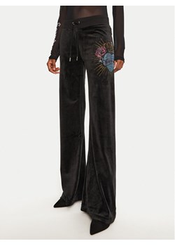 Juicy Couture Spodnie dresowe Scared Heart JCBBJ224817 Czarny Flared Leg ze sklepu MODIVO w kategorii Spodnie damskie - zdjęcie 181076362