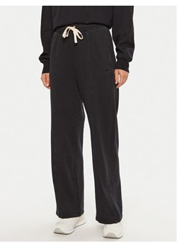 Champion Spodnie dresowe 117638 Czarny Wide Leg ze sklepu MODIVO w kategorii Spodnie damskie - zdjęcie 181076524