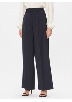 Dixie Spodnie materiałowe PCHSVCGA Granatowy Relaxed Fit ze sklepu MODIVO w kategorii Spodnie damskie - zdjęcie 181076724