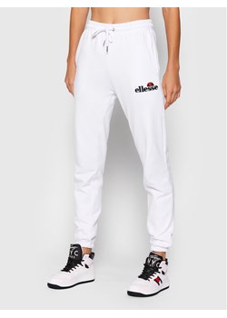 Ellesse Spodnie dresowe Noora SGK13459 Biały Regular Fit ze sklepu MODIVO w kategorii Spodnie damskie - zdjęcie 181077082