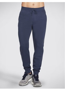 Skechers Spodnie dresowe Sweats Essential Jogger PT16 Szary Regular Fit ze sklepu MODIVO w kategorii Spodnie męskie - zdjęcie 181078652