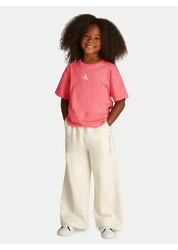 Calvin Klein Jeans T-Shirt Logo IG0IG02136 Różowy Boxy Fit ze sklepu MODIVO w kategorii Bluzki dziewczęce - zdjęcie 181079401