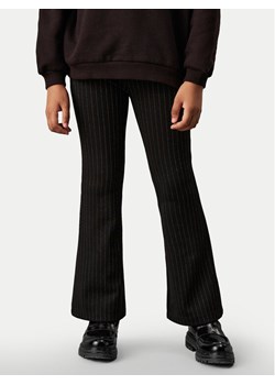 Calvin Klein Jeans Spodnie materiałowe IG0IG02734 Czarny Flare Fit ze sklepu MODIVO w kategorii Spodnie dziewczęce - zdjęcie 181081613
