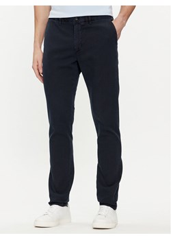 Tommy Hilfiger Chinosy Bleecker MW0MW33910 Granatowy Slim Fit ze sklepu MODIVO w kategorii Spodnie męskie - zdjęcie 181082954