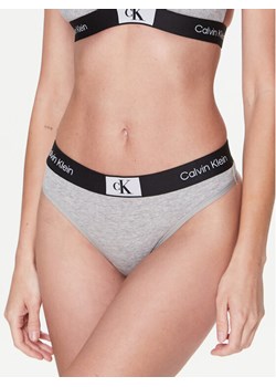 Calvin Klein Underwear Stringi 000QF7221E Szary ze sklepu MODIVO w kategorii Majtki damskie - zdjęcie 181083951