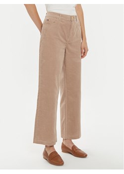 Tommy Hilfiger Spodnie materiałowe WW0WW43631 Beżowy Relaxed Fit ze sklepu MODIVO w kategorii Spodnie damskie - zdjęcie 181084174