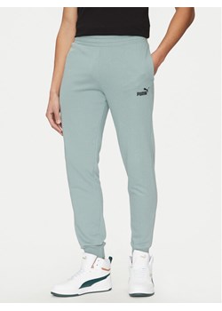 Puma Spodnie dresowe Ess No. 1 Logo 682609 Zielony Regular Fit ze sklepu MODIVO w kategorii Spodnie męskie - zdjęcie 181084240