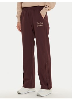 Champion Spodnie dresowe 117511 Brązowy Wide Leg ze sklepu MODIVO w kategorii Spodnie damskie - zdjęcie 181084342