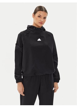 adidas Bluza City Escape IQ4824 Czarny Loose Fit ze sklepu MODIVO w kategorii Bluzy damskie - zdjęcie 181086480