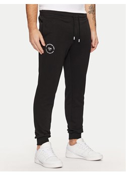 Jack&Jones Spodnie dresowe Gordon 12268442 Czarny Regular Fit ze sklepu MODIVO w kategorii Spodnie męskie - zdjęcie 181087380