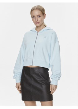 Calvin Klein Jeans Bluza J20J222885 Niebieski Relaxed Fit ze sklepu MODIVO w kategorii Bluzy damskie - zdjęcie 181088450