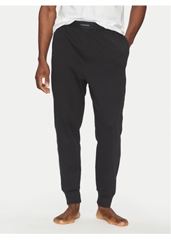 Calvin Klein Underwear Spodnie piżamowe 000NM2706E Czarny Regular Fit ze sklepu MODIVO w kategorii Piżamy męskie - zdjęcie 181089272