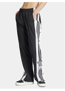 adidas Spodnie dresowe Adibreak IU2519 Czarny Regular Fit ze sklepu MODIVO w kategorii Spodnie damskie - zdjęcie 181090130