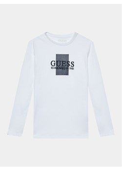 Guess Bluzka L3BI10 I3Z14 Biały Regular Fit ze sklepu MODIVO w kategorii T-shirty chłopięce - zdjęcie 181090913