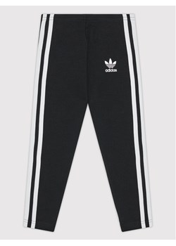 adidas Legginsy adicolor Tights H25256 Czarny Slim Fit ze sklepu MODIVO w kategorii Spodnie dziewczęce - zdjęcie 181090944