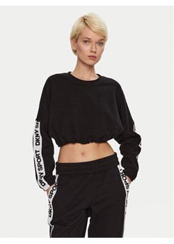 DKNY Sport Spodnie dresowe DP4P3462 Czarny Regular Fit ze sklepu MODIVO w kategorii Spodnie damskie - zdjęcie 181092313