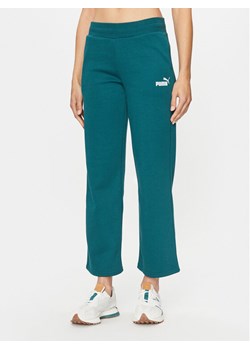 Puma Spodnie dresowe Ess+ 676093 Zielony Regular Fit ze sklepu MODIVO w kategorii Spodnie damskie - zdjęcie 181092372