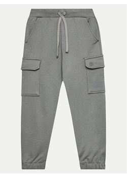 United Colors Of Benetton Spodnie dresowe 3FWYGF045 Szary Regular Fit ze sklepu MODIVO w kategorii Spodnie chłopięce - zdjęcie 181092411