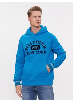Tommy Hilfiger Bluza Collegiate MW0MW32682 Niebieski Regular Fit ze sklepu MODIVO w kategorii Bluzy męskie - zdjęcie 181092732
