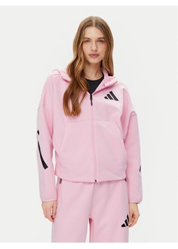 adidas Bluza Z.N.E. JC5393 Różowy Loose Fit ze sklepu MODIVO w kategorii Bluzy damskie - zdjęcie 181094050