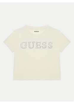 Guess T-Shirt J4YI48 KBXI2 Écru Regular Fit ze sklepu MODIVO w kategorii Bluzki dziewczęce - zdjęcie 181094980