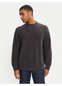 Calvin Klein Jeans Sweter J30J326202 Czarny Boxy Fit ze sklepu MODIVO w kategorii Swetry męskie - zdjęcie 181095590