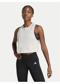 adidas Koszulka techniczna Train Essentials Boxy Workout JC9557 Beżowy Regular Fit ze sklepu MODIVO w kategorii Bluzki damskie - zdjęcie 181095960