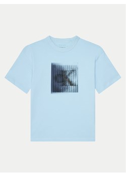 Calvin Klein Jeans T-Shirt IB0IB02356 Błękitny Regular Fit ze sklepu MODIVO w kategorii T-shirty chłopięce - zdjęcie 181096332