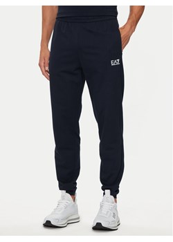 EA7 Emporio Armani Spodnie dresowe 8NPP66 PJVRZ 1562 Granatowy Regular Fit ze sklepu MODIVO w kategorii Spodnie męskie - zdjęcie 181096911
