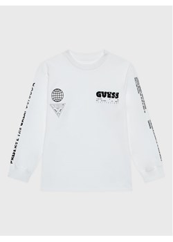 Guess Bluzka L2BI04 I3Z13 Biały Oversize ze sklepu MODIVO w kategorii T-shirty chłopięce - zdjęcie 181097212