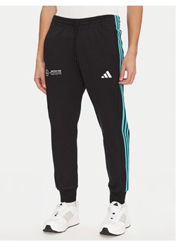 adidas Spodnie dresowe Mercedes - AMG Petronas Formula One Team DNA JV5379 Czarny Regular Fit ze sklepu MODIVO w kategorii Spodnie męskie - zdjęcie 181097231
